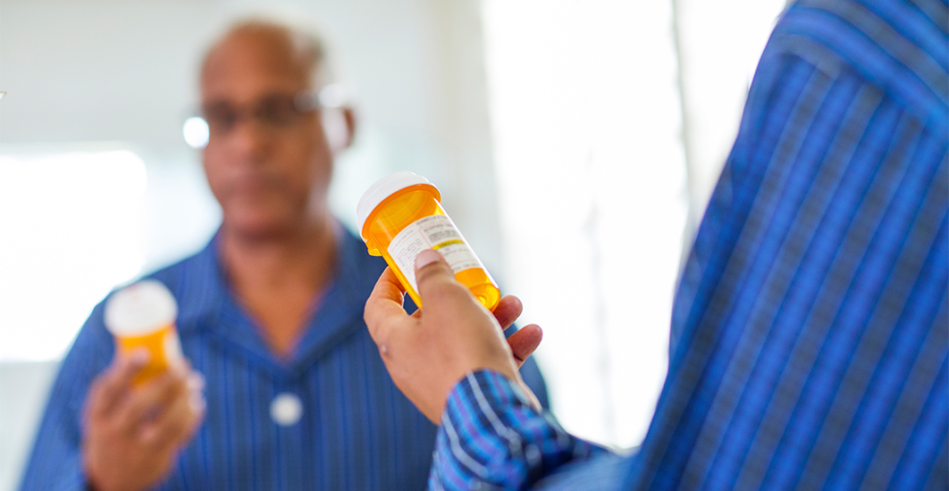 man holding medication