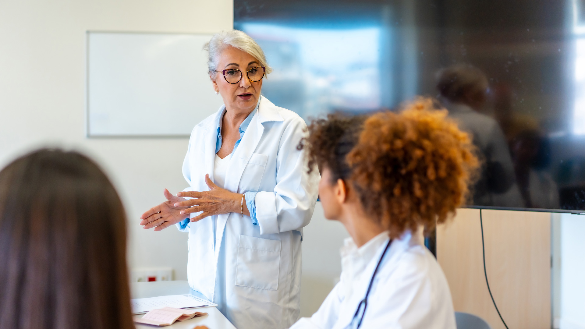 Doctors speaking together
