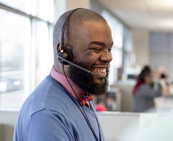 Man smiling on phone