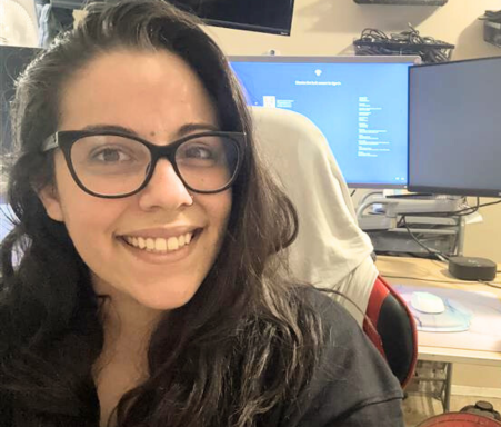 woman sitting in front of computer