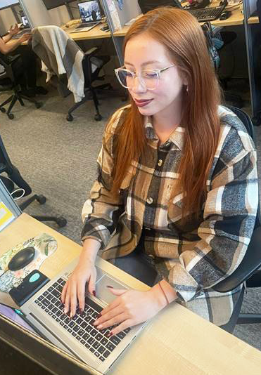 valentina sitting at desk