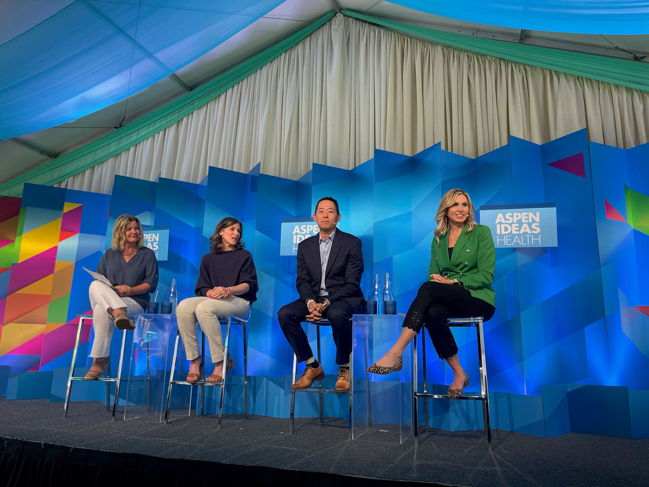 picture of Kristen Duffey onstage at a panel discussion for Aspen Health